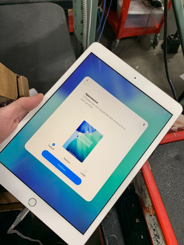 Photo 1 of Apple iPad (10.2-inch, Wi-Fi, 32GB) - Silver (Latest Model, 8th Generation) (Renewed)