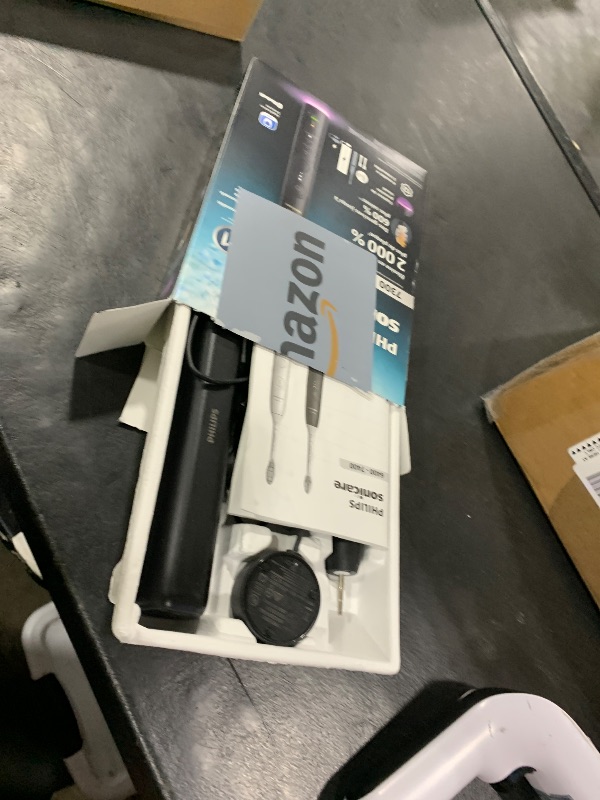 Photo 1 of Philips Sonicare 7300 Series Electric Toothbrush - Next-Generation Sonicare Technology, Pressure Sensor, 12 Brushing Settings, SmarTimer, BrushPacer, 21-Day Runtime, Travel Case, Black, HX7421/07