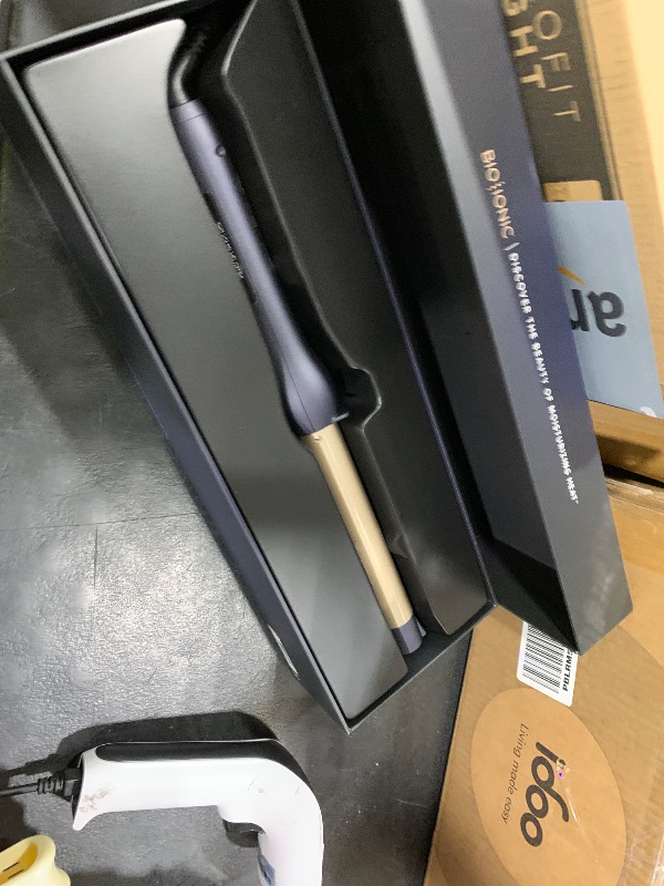 Photo 1 of Bio Ionic GoldPro 1" Curling Wand, Blue, Moisture Heat Technology & 24K Gold MX, Ceramic Long Barrel with Adjustable Heat, Versatile Hair Curler for Long-Lasting Curls