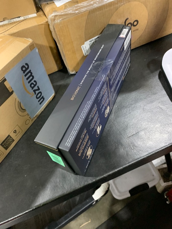 Photo 1 of Bio Ionic GoldPro 1" Curling Wand, Blue, Moisture Heat Technology & 24K Gold MX, Ceramic Long Barrel with Adjustable Heat, Versatile Hair Curler for Long-Lasting Curls