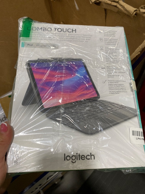 Photo 1 of Logitech Combo Touch, Detachable iPad Keyboard Case (10th gen and A16) with Large Precision Trackpad, Full-Size Backlit Keyboard, and Smart Connector Technology - Oxford Gray