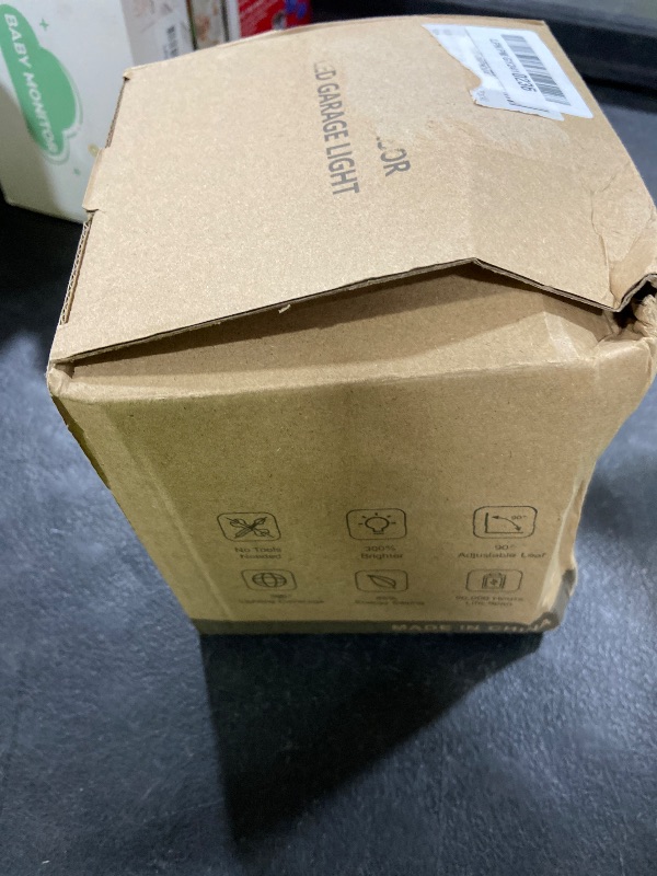 Photo 1 of RUNBARRY Motion Sensor Garage Light Plug in - 25000LM Motion Sensor Shop Light with 8+1 LED Panels, 6500K Bay Lighting, for Garage, Workshop, Utility Room, Basement (1 Pack)