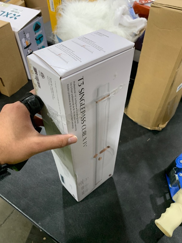 Photo 1 of T3 SinglePass Curl X Extra-Long Barrel Curling Iron with 9 Heat Settings and Ceramic Barrel for Fast Styling and Lasting Results on All Hair Types