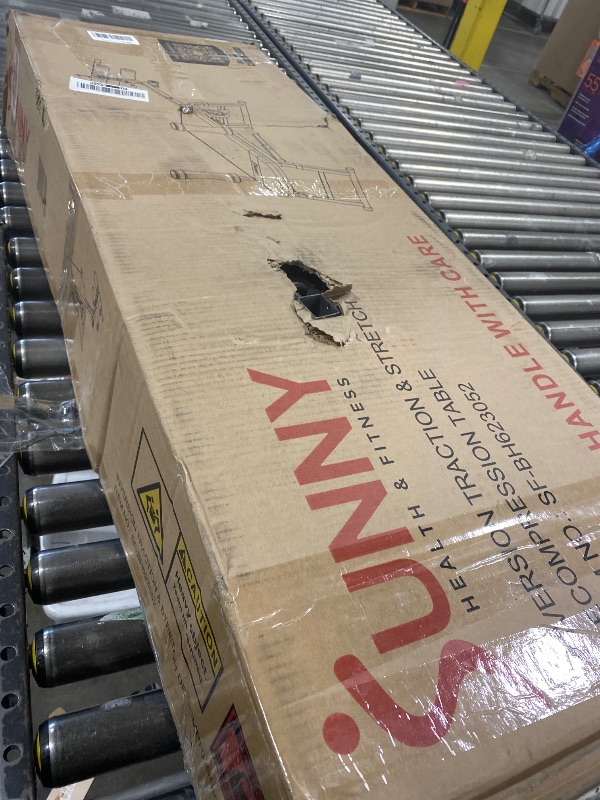 Photo 1 of Sunny Health & Fitness No-Hang Traction & Stretch Decompression Table for Back Pain Relief, Adjustable Stretch Bench, 400 LB Capacity