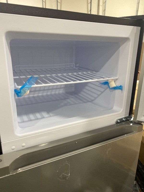 Photo 1 of Frigidaire, 2 Door Apartment Size Refrigerator with Freezer, 7.5 cu ft, Adjustable Spill-Proof Shelves, Crisper Bins, Platinum Silver, Garage Ready