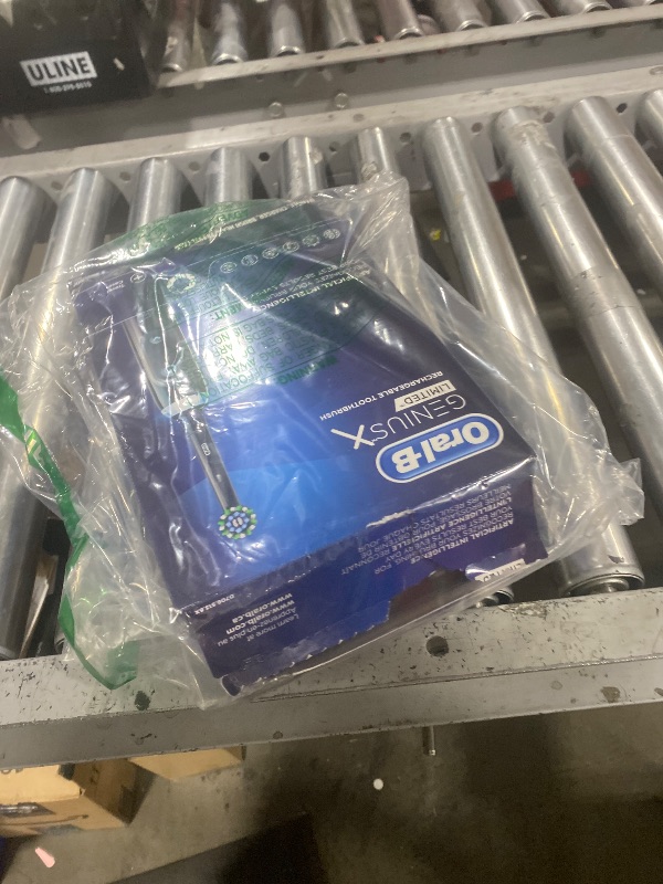 Photo 1 of Oral-B Genius X Limited Rechargeable Electric Toothbrush with 1 Replacement Brush Head, Travel Case, Midnight Black