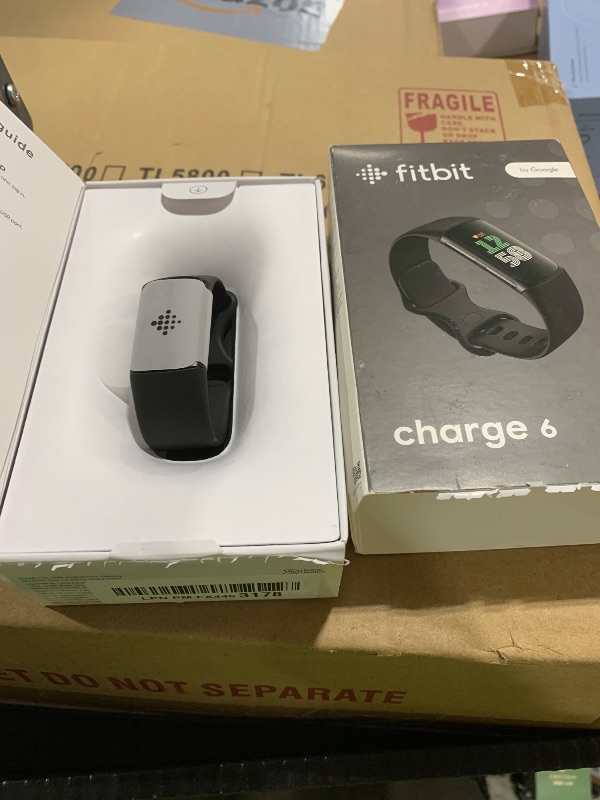 Photo 1 of Fitbit Charge 6 Fitness Tracker with Google apps, Heart Rate on Exercise Equipment, 6-Months Premium Membership Included, GPS, Health Tools and More, Obsidian/Black, One Size (S & L Bands Included)