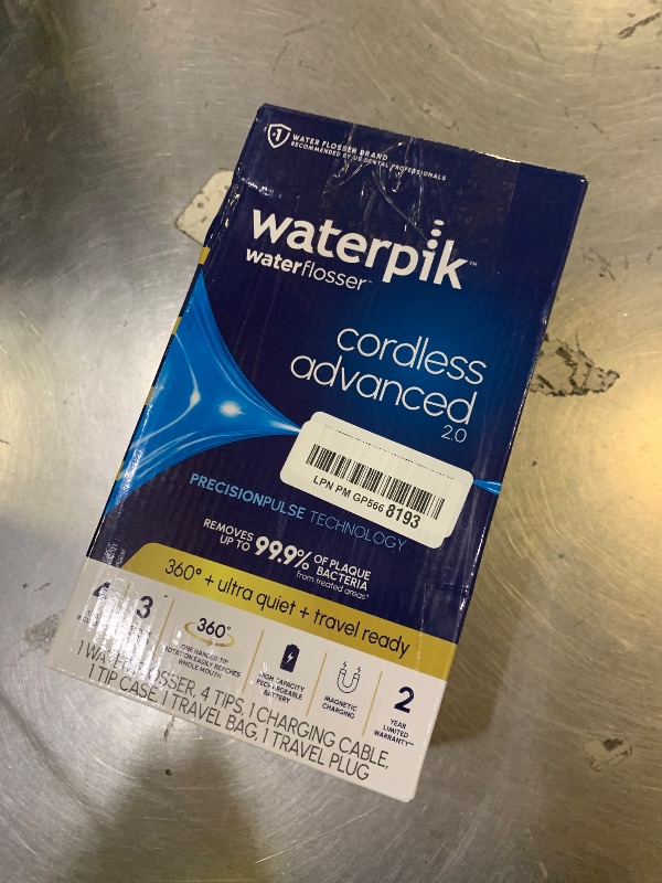 Photo 1 of Waterpik Cordless Advanced 2.0 Water Flosser For Teeth, Gums, Braces, Dental Care With Travel Bag and 4 Tips, ADA Accepted, Rechargeable, Portable, and Waterproof, Gray WP-587, Packaging May Vary
