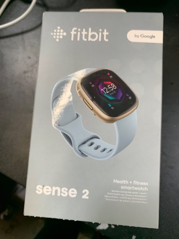 Photo 1 of Fitbit Sense 2 Advanced Health and Fitness Smartwatch with Tools to Manage Stress and Sleep, ECG App, SpO2, 24/7 Heart Rate and GPS, Blue Mist/Pale Gold, One Size (S & L Bands Included)