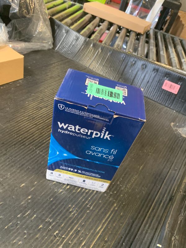 Photo 1 of Waterpik Cordless Advanced 2.0 Water Flosser For Teeth, Gums, Braces, Dental Care With Travel Bag and 4 Tips, ADA Accepted, Rechargeable, Portable, and Waterproof, White WP-580, Packaging May Vary