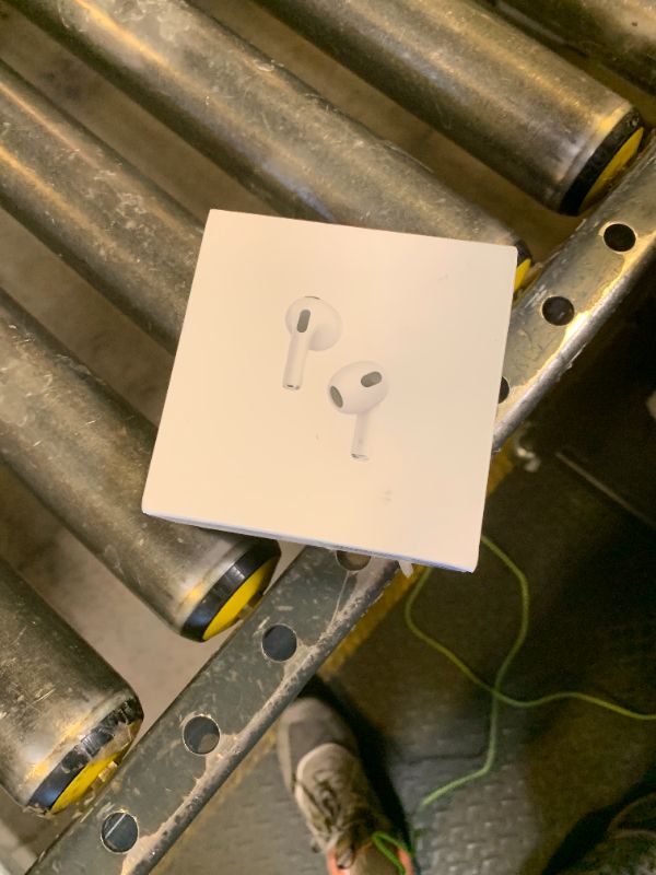 Photo 1 of Apple AirPods (3rd Generation) Wireless Ear Buds, Bluetooth Headphones, Personalized Spatial Audio, Sweat and Water Resistant, Lightning Charging Case Included, Up to 30 Hours of Battery Life