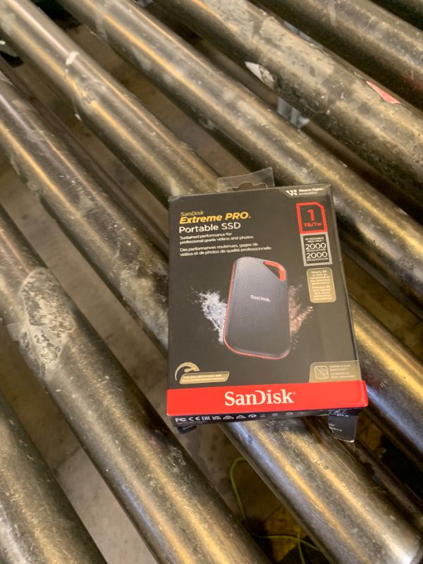 Photo 1 of SANDISK 1TB Extreme PRO Portable SSD - Up to 2000MB/s - USB-C, USB 3.2 Gen 2x2, IP65 Water and Dust Resistance, Updated Firmware - External Solid State Drive - SDSSDE81-1T00-G25