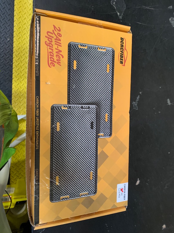 Photo 1 of DCRCFIBER 100% Carbon Fiber License Plate Frame,New Full Carbon Fiber snap-on 4 Hole License Plate Frame,unobstructed View,with Screw Caps, Anti-Vibration Pads