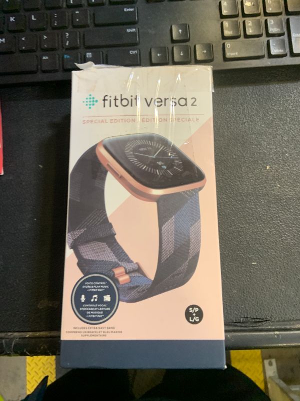 Photo 1 of Fitbit Versa 2 Special Edition Health and Fitness Smart Watch with Heart Rate, Music, Alexa Built-In, Sleep and Swim Tracking, Navy and Pink Woven/Copper Rose, One Size (S and L Bands Included), 2.3