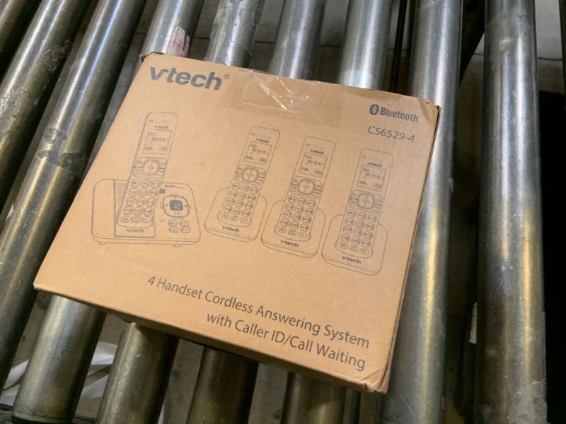 Photo 1 of VTech CS6529-4 DECT 6.0 Phone Answering System with Caller ID/Call Waiting, 4 Cordless Handsets, Silver/Black