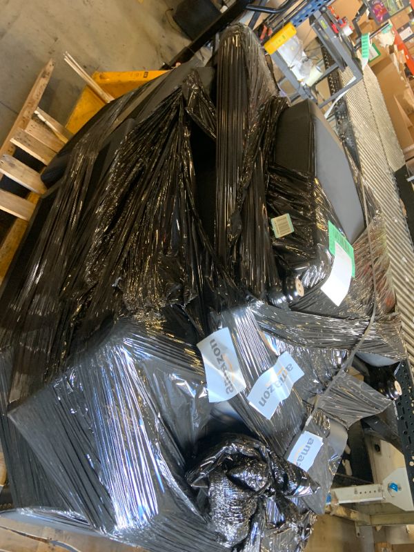 Photo 1 of black pleather couch(unknown if faux or real)
