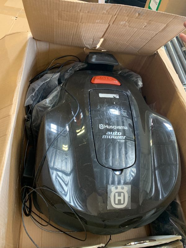 Photo 1 of Husqvarna Automower 115H 4G Robotic Lawn Mower with Patented Guidance System, Automatic Lawn Mower with Self Installation and Ultra-Quiet Smart Mowing Technology for Small to Medium Yards (0.4 Acre)