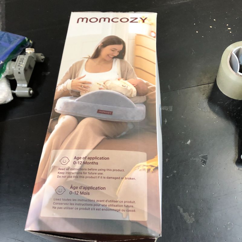 Photo 1 of Momcozy Innovative Safety Guard Nursing Pillow - Firm & Springy Memory Foam - Stable, Ergonomic Support & Comfort - Wider Breastfeeding Cushion, Adjustable, Removable Cover, Baby Safety Certified