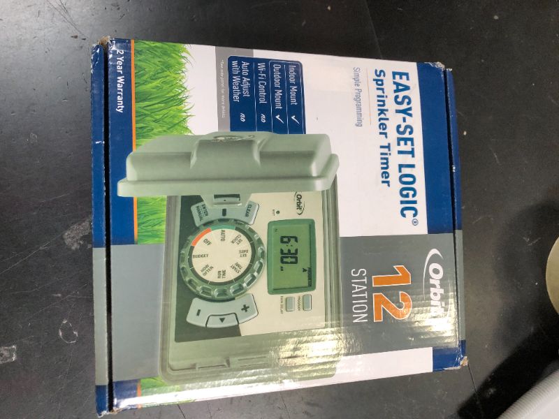 Photo 1 of Orbit 57900 12-Station Outdoor Swing Panel Sprinkler System Timer