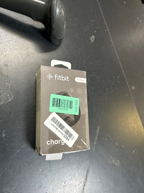 Photo 1 of Fitbit Charge 6 Fitness Tracker with Google Apps - Heart Rate on Exercise Equipment - 3-Month Google Health Premium Membership Included - Health Tools - Obsidian/Black - Small&Large Bands Included