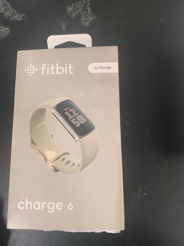 Photo 1 of Fitbit Charge 6 Fitness Tracker with Google apps, Heart Rate on Exercise Equipment, 6-Months Premium Membership Included, GPS, Health Tools and More, Porcelain/Silver, One Size (S & L Bands Included)