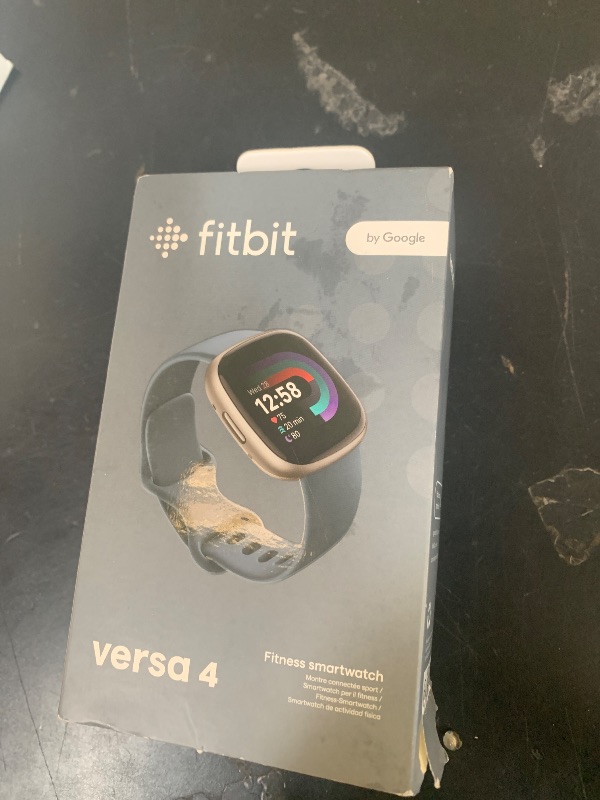 Photo 1 of Fitbit Versa 4 Fitness Smartwatch with Daily Readiness, GPS, 24/7 Heart Rate, 40+ Exercise Modes, Sleep Tracking and more, Waterfall Blue/Platinum, One Size (S & L Bands Included)