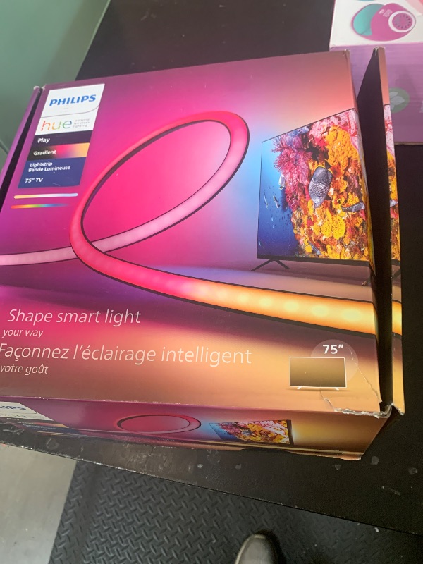 Photo 1 of Philips Hue 75" Smart Light Strip - White and Color Ambiance LED Color-Changing TV Backlight - Sync with Television, Music, Gaming - Requires Bridge and Sync Box