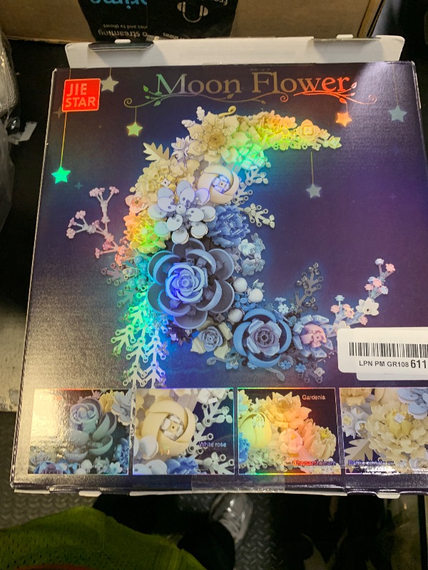 Photo 1 of Sahteg 934PCS Blue Moon Flower Building Blocks Kit for Adults, Crescent Moon Botanical Art Display, Artificial Flowers Building Set for Home Décor Wall Art Decoration