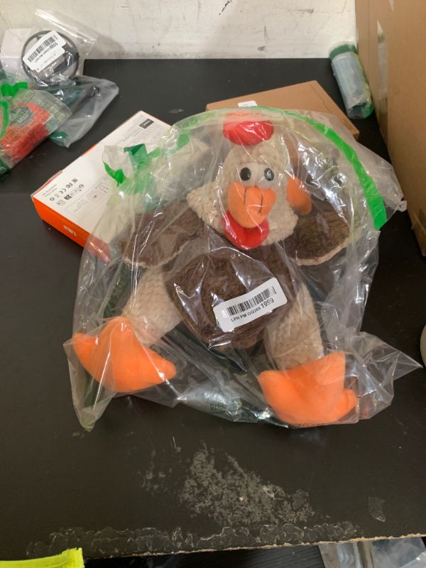 Photo 1 of goDog, Checkers Fat Rooster, Squeaker Dog Toy, Chew Resistant, Durable Plush, Soft, Tough, Reinforced Seams, Brown, Large