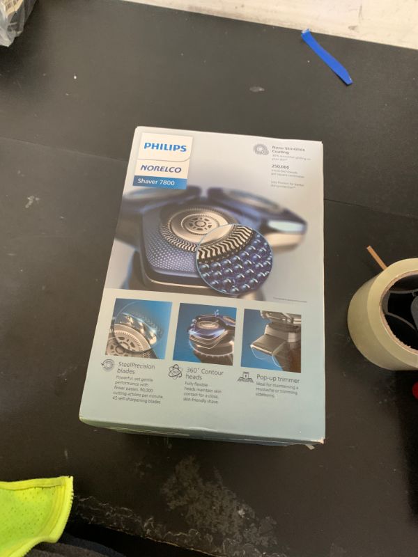 Photo 1 of Philips Norelco Shaver 7800, Rechargeable Wet & Dry Electric Shaver with SenseIQ Technology, Quick Clean Pod, Charging Stand, Travel Case and Pop-up Trimmer, S7885/85