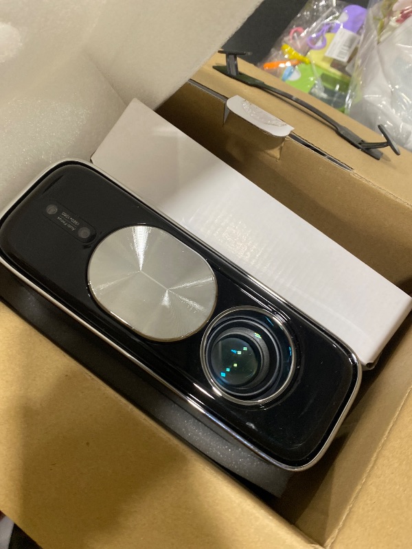 Photo 1 of Smart 4K Projector [Bundled with Google TV Stick] with WiFi and Bluetooth, 2500ANSI, Auto Lens Cap, Portable Outdoor Movie Projector with Built-in Apps Auto Focus for Ceiling/Home Theater/Bedroom