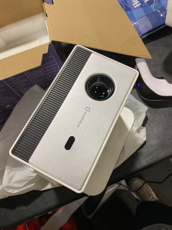 Photo 1 of 1500 ANSI Smart Projector, Portable Projector with WiFi and Bluetooth, HAPPRUN 4K Full HD Home Theater with 270° Stand, Dolby Sound, Built-in Apps,Compatible with Phone & PC, Indoor & Outdoor Use