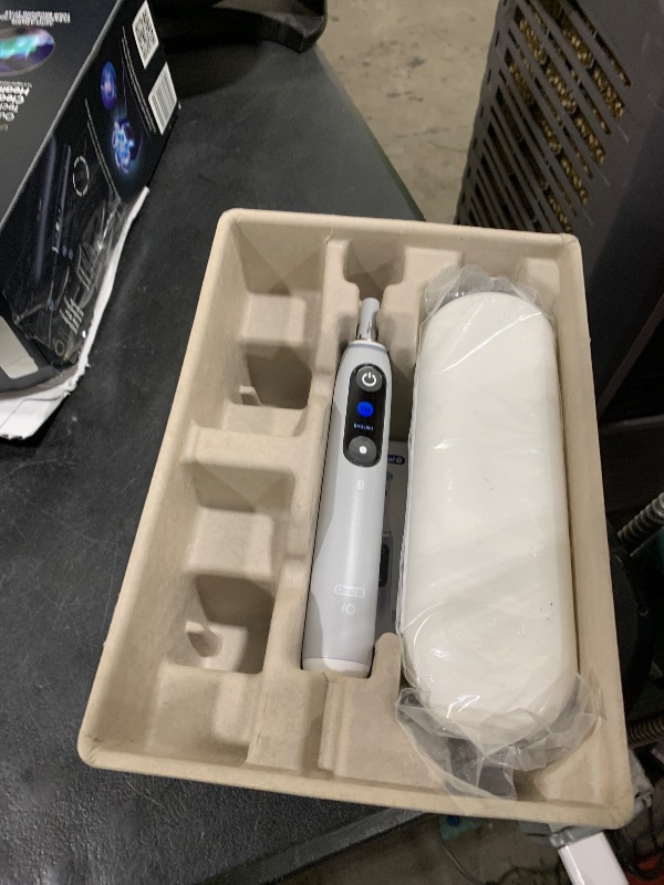 Photo 1 of TOOTHBRUSH IS AN ORAL B IO- SEE LIVE PHOTOS FOR COLOR - STOCK PHOTO IS ONLY FOR REFERENCE OF ITEM - ITEM MAY BE DIFFERENT THAN ACTUAL DESCRIPTION BUT SIMILAR - Oral-B Rechargeable Electric Toothbrush, iO9 Limited Ultimate Clean, 7 Cleaning Modes, Interact
