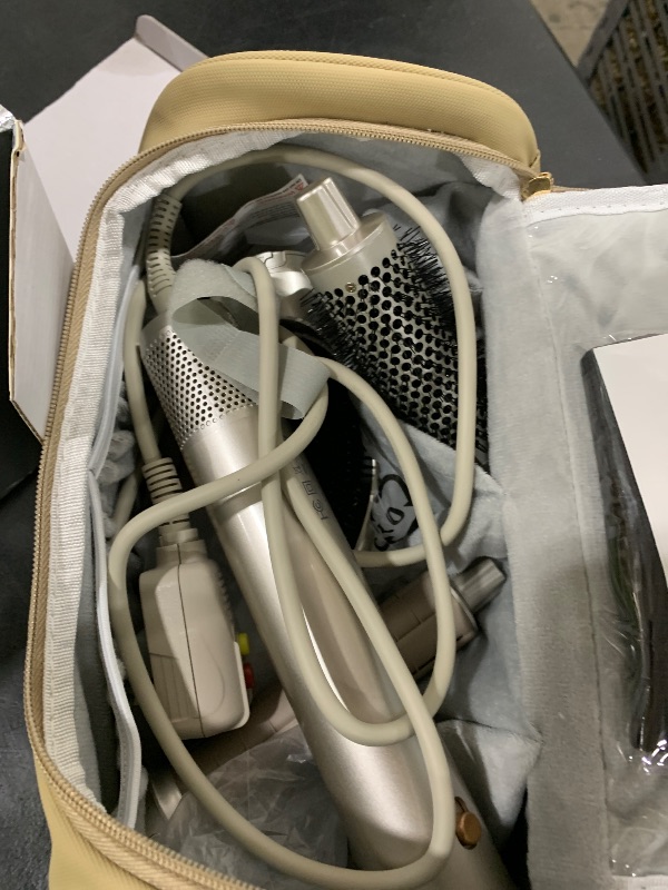 Photo 1 of UKLISS 6-in-1 Hot Air Hair Styler with 110,000 RPM High-Speed Hair Dryer Auto Curling Wrap Round Blow Dryer Brush Create Volumizing Waves and Straight Styles Included Travel Case