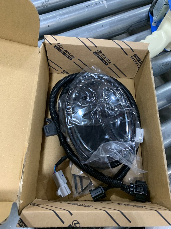 Photo 1 of Toyota LED Lighted Front Grille Emblem, Dark Chrome, for 2024+ Tacoma TRD Sport and Off-Road Models