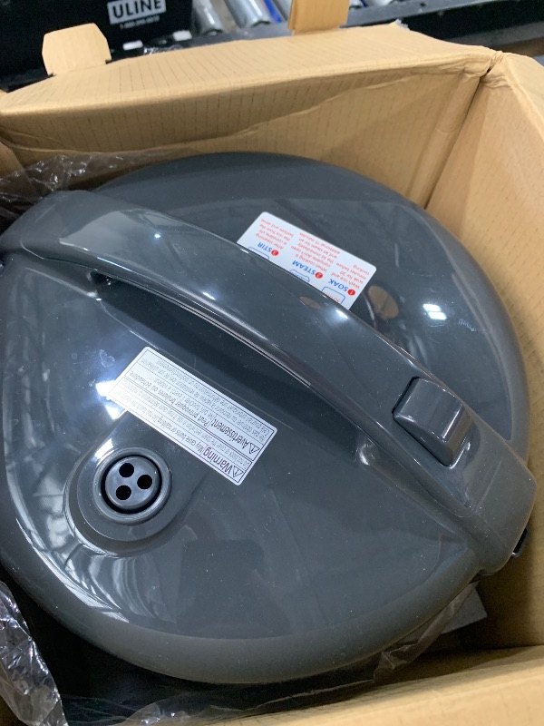 Photo 1 of Tiger JNP-S18U-KY 10 Cup Capacity Rice Cooker with Non-Stick Inner Pot, Retractable Power Cord, and Keep Warm up to 12 hours, Black