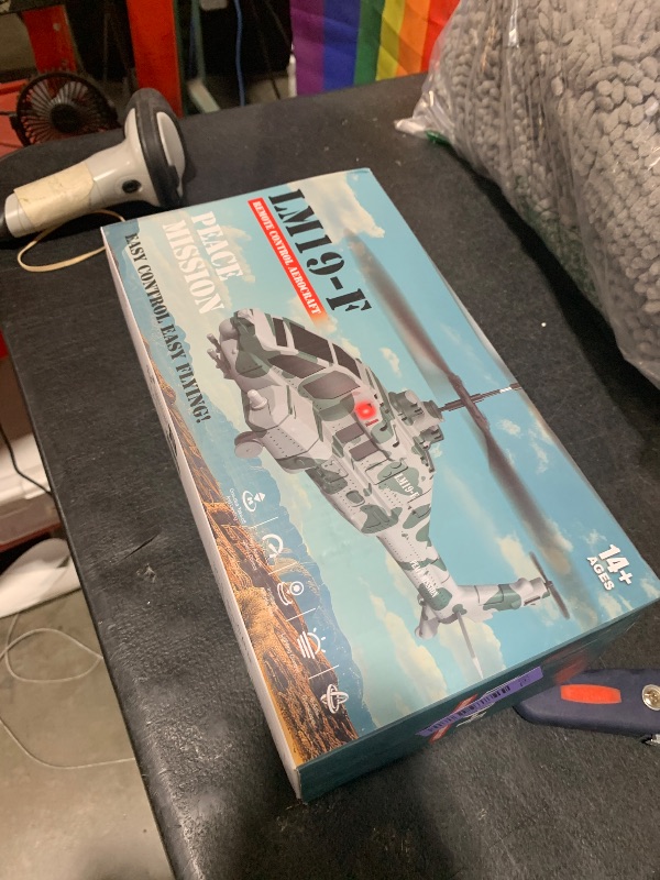 Photo 1 of LMRC RC Helicopter with 10 Missiles, 2.4GHz LM19-F Army Remote Control Helicopter, Military Helicopter for Kids, LED Lights, Altitude Hold, One-Key Take Off, Indoor Friendly