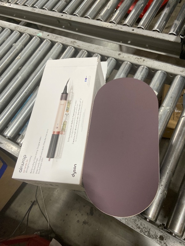 Photo 1 of Dyson Airwrap Co-anda2x Multi-Styler and Dryer Straight+Wavy in Ceramic Pink
