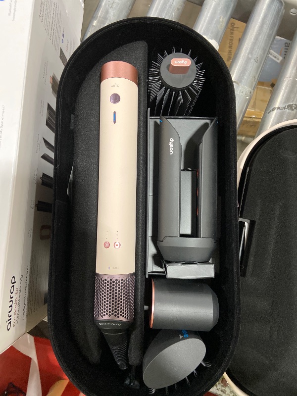 Photo 1 of Dyson Airwrap Co-anda2x Multi-Styler and Dryer Straight+Wavy in Ceramic Pink