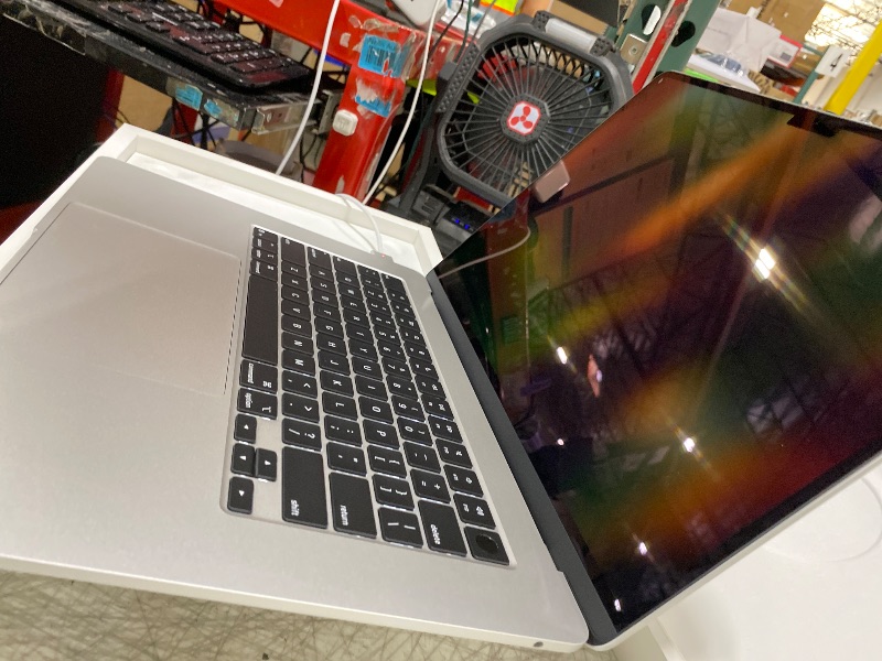 Photo 1 of Apple 2025 MacBook Air 15-inch Laptop with M4 chip: Built for Apple Intelligence, 15.3-inch Liquid Retina Display, 24GB Unified Memory, 512GB SSD Storage, 12MP Center Stage Camera, Touch ID; Silver