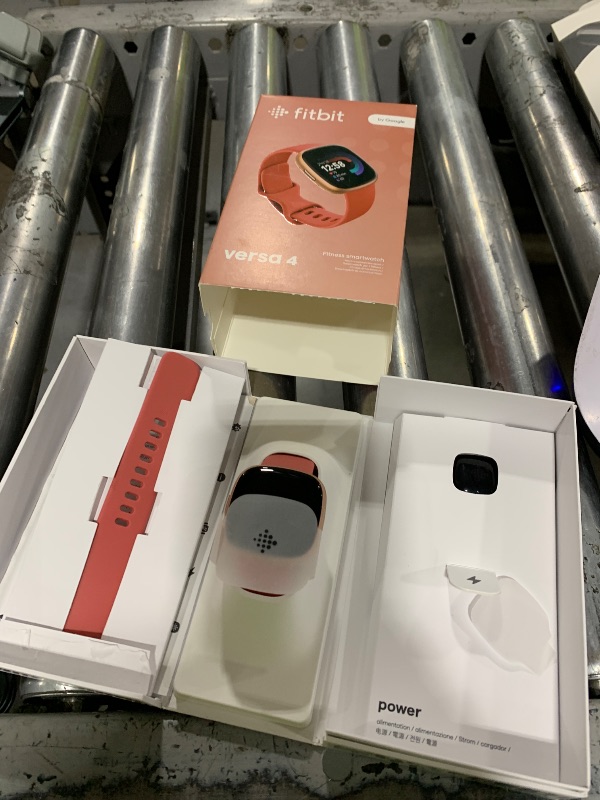 Photo 1 of Fitbit Versa 4 Fitness Smartwatch with Daily Readiness - 3-Month Google Health Premium Membership Included - GPS, 24/7 Heart Rate, 40+ Exercise Modes, Sleep Tracking - Pink Sand/Copper Rose