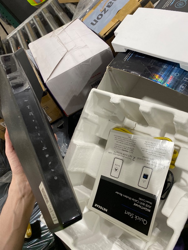 Photo 1 of NETGEAR Nighthawk Cable Modem and WiFi 6 Router Combo (CAX80) - Compatible with All Major Cable Providers incl. Xfinity, Spectrum, Cox - Cable Plans up to 2 Gbps - AX6000 WiFi 6 Speed - DOCSIS 3.1