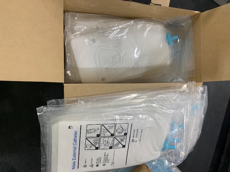 Photo 1 of Male External Catheter, Non-Invasive Urinary Management, Absorbent Fabric, Secure Adhesive Fit, 30 Pack