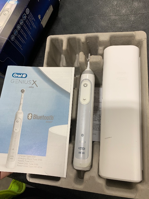 Photo 1 of Oral-B Genius X Limited Rechargeable Electric Toothbrush with 1 Replacement Brush Head, Travel Case, White