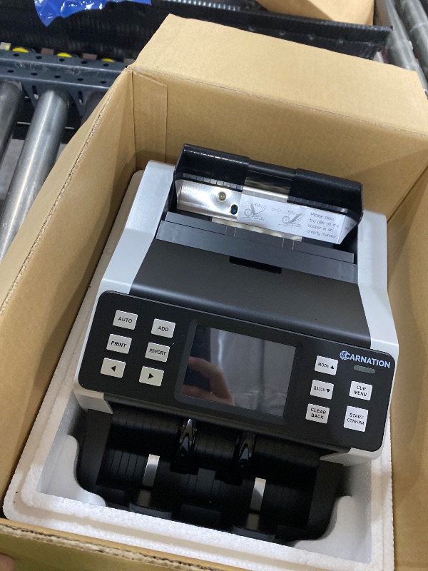 Photo 1 of CARNATION Money Counter Machine – Cash Counting & Mixed Denomination Bill Counter, Portable Currency Detector, Counterfeit Bank Scanner, Dollar Sorter for Commercial, up to 1200 N/M, UV/MG/MT/IR/CIS