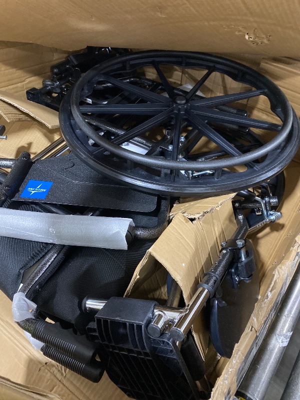Photo 1 of Medline Comfortable Folding Wheelchair with Swing-Back, Desk-Length Arms and Elevating Footrests, 20”W x 16”D Seat