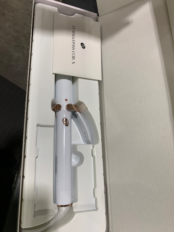 Photo 1 of T3 SinglePass Curl X Extra-Long Barrel Curling Iron with 9 Heat Settings and Ceramic Barrel for Fast Styling and Lasting Results on All Hair Types