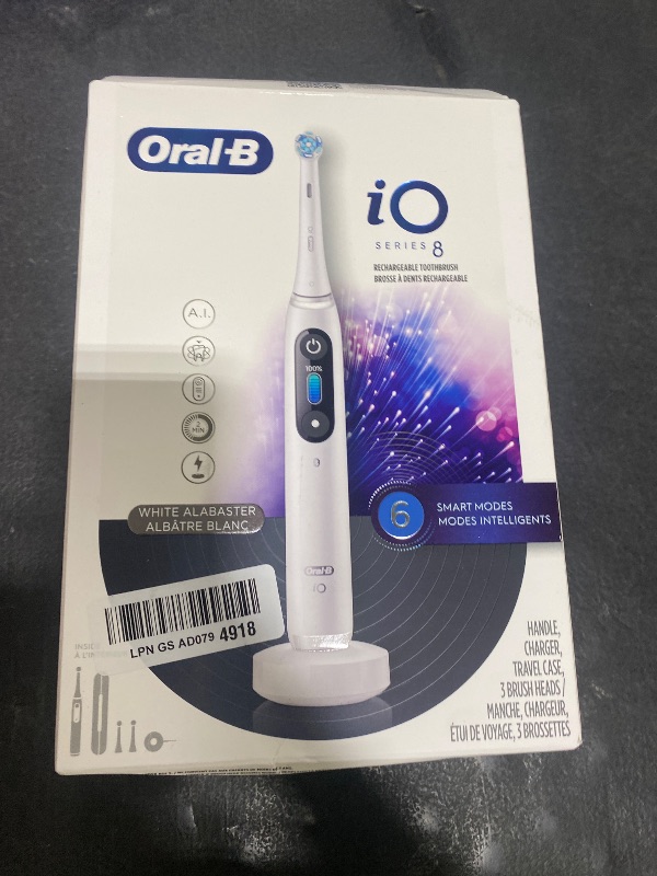 Photo 1 of Oral-B iO Series 8 Electric Toothbrush with 2 Replacement Brush Heads and Travel Case, Rechargeable Toothbrush, Whitealabaster