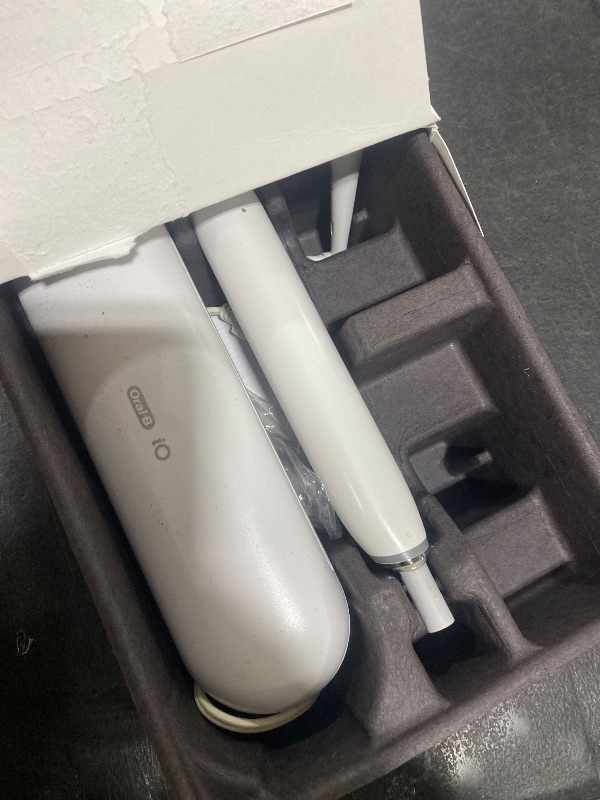 Photo 1 of Oral-B iO Series 8 Electric Toothbrush with 2 Replacement Brush Heads and Travel Case, Rechargeable Toothbrush, Whitealabaster