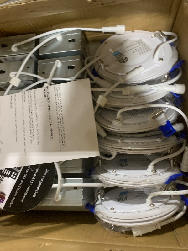 Photo 1 of Meconard 12 Pack 4 Inch Ultra-Thin LED Recessed Ceiling Light with Junction Box, 3000K/4000K/5000K Selectable, 9W=75W 750LM High Brightness, Dimmable Canless Downlights, ETL and Energy Star Listed